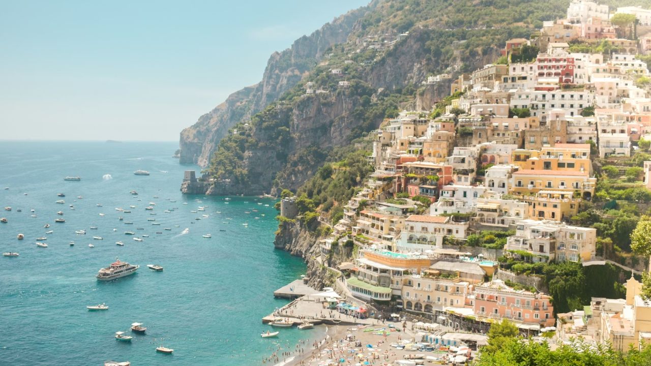 What Are the Most Scenic Stops on Positano Boat Tours Along the Amalfi Coast?